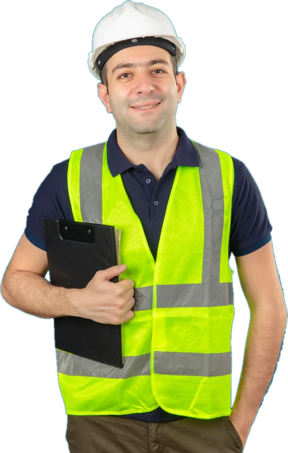 Trabajador con chaleco reflectivo y casco